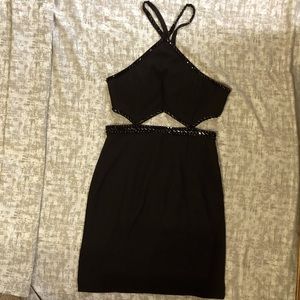 Brand-new Forever Lovely Black Dress with black crystals. Size Small.